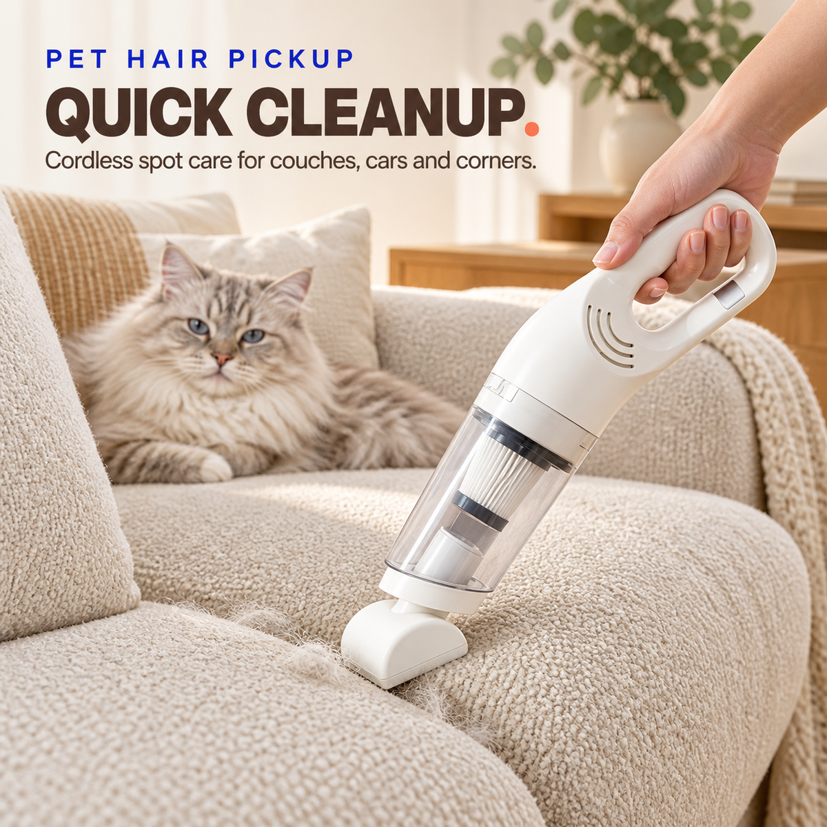 White cordless pet hair vacuum cleaning loose fur from a cream sofa while a cat rests safely nearby.