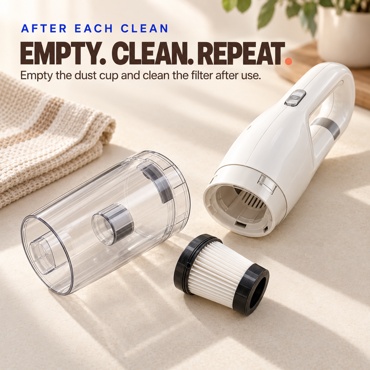 White cordless pet hair vacuum with removable clear dust cup and pleated filter.