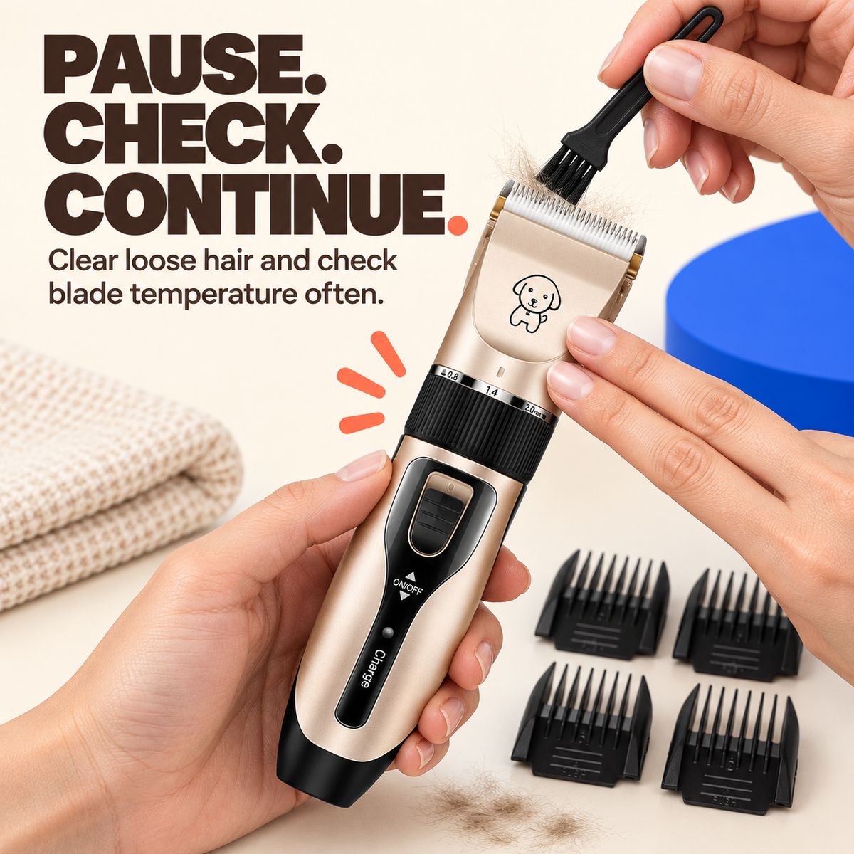 Cleaning brush clears loose hair from the blade of a Champagne cordless pet clipper.