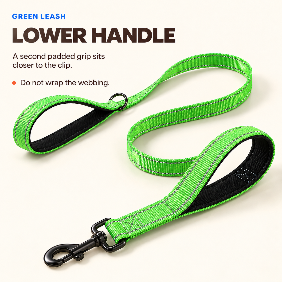 Green reflective double-handle dog leash with the lower padded handle shown near the clip.